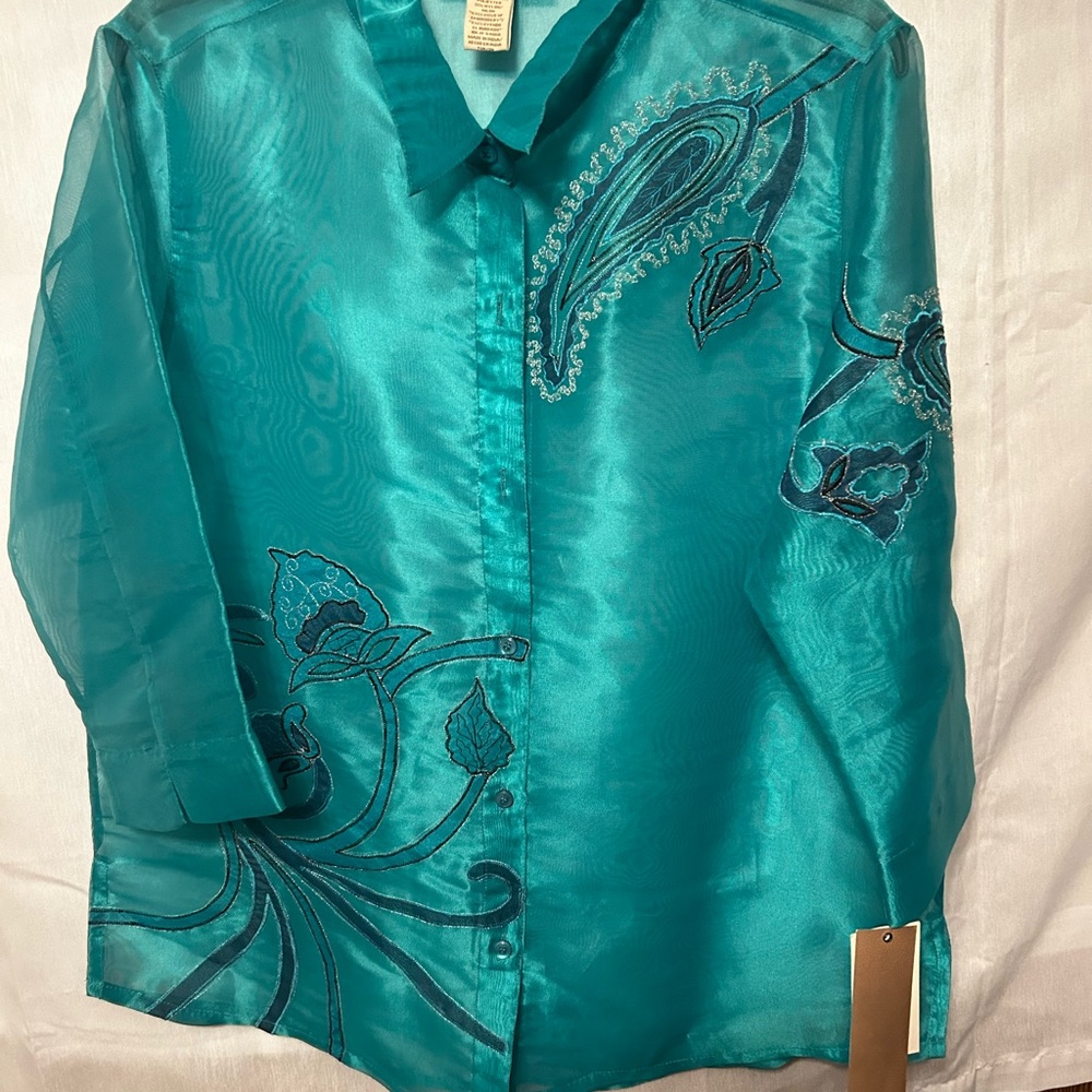 Teal organza festive blouse with navy, black & blue on the front & sleeve.